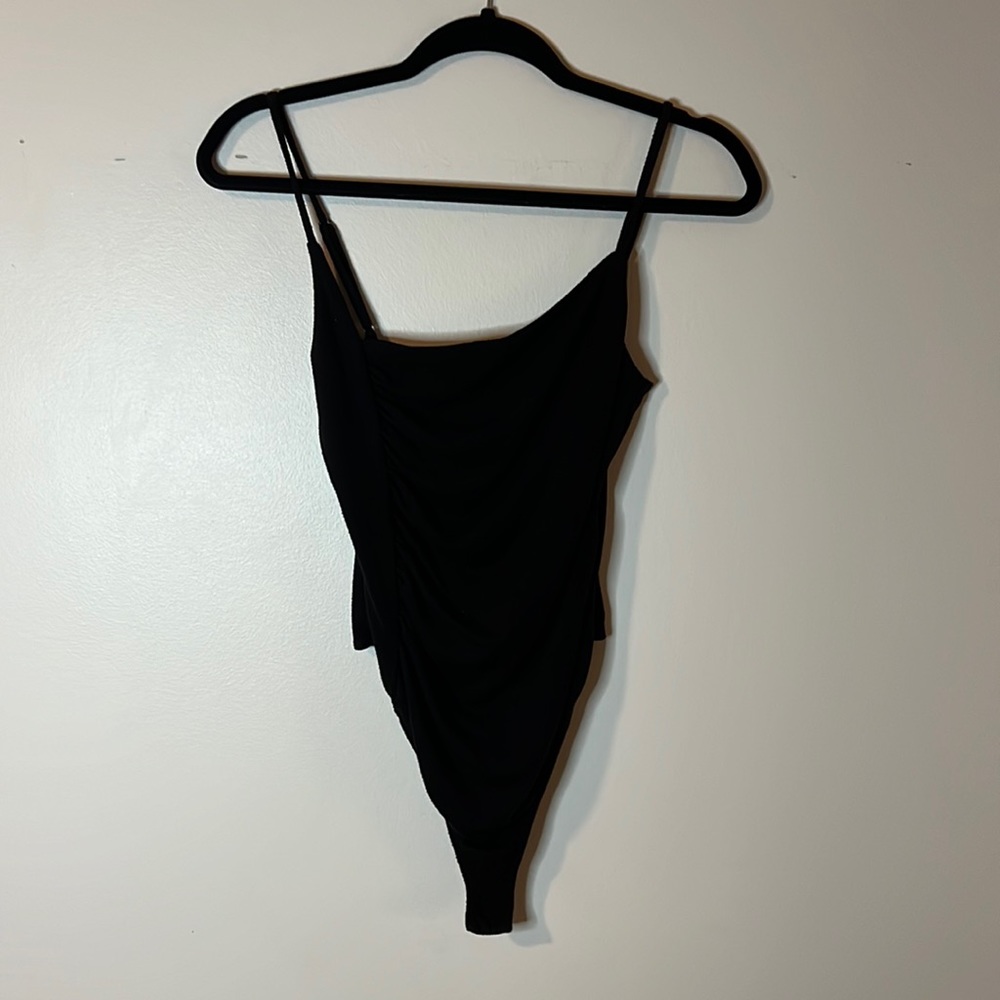 Asymmetrical black bodysuit